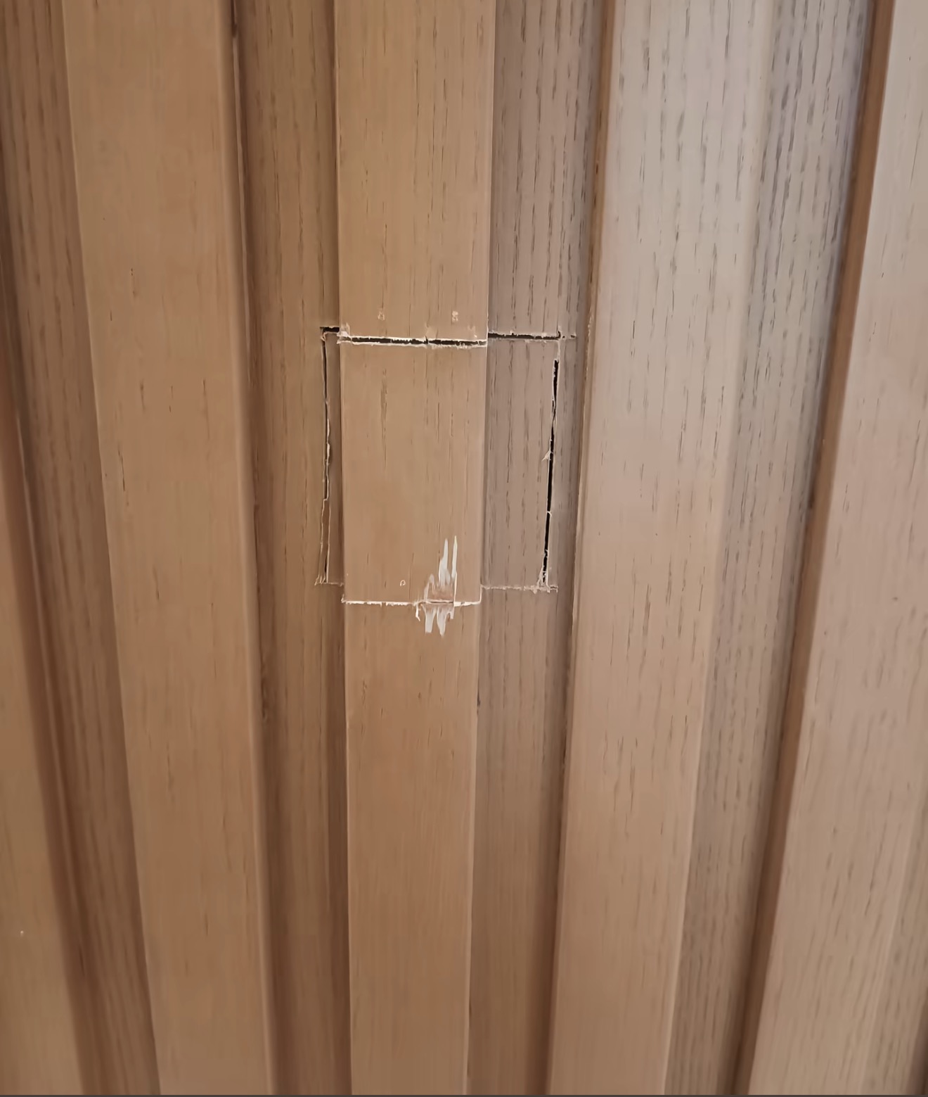 Wood-Grain Profile Repair — Before: Visible edges around the local patch.