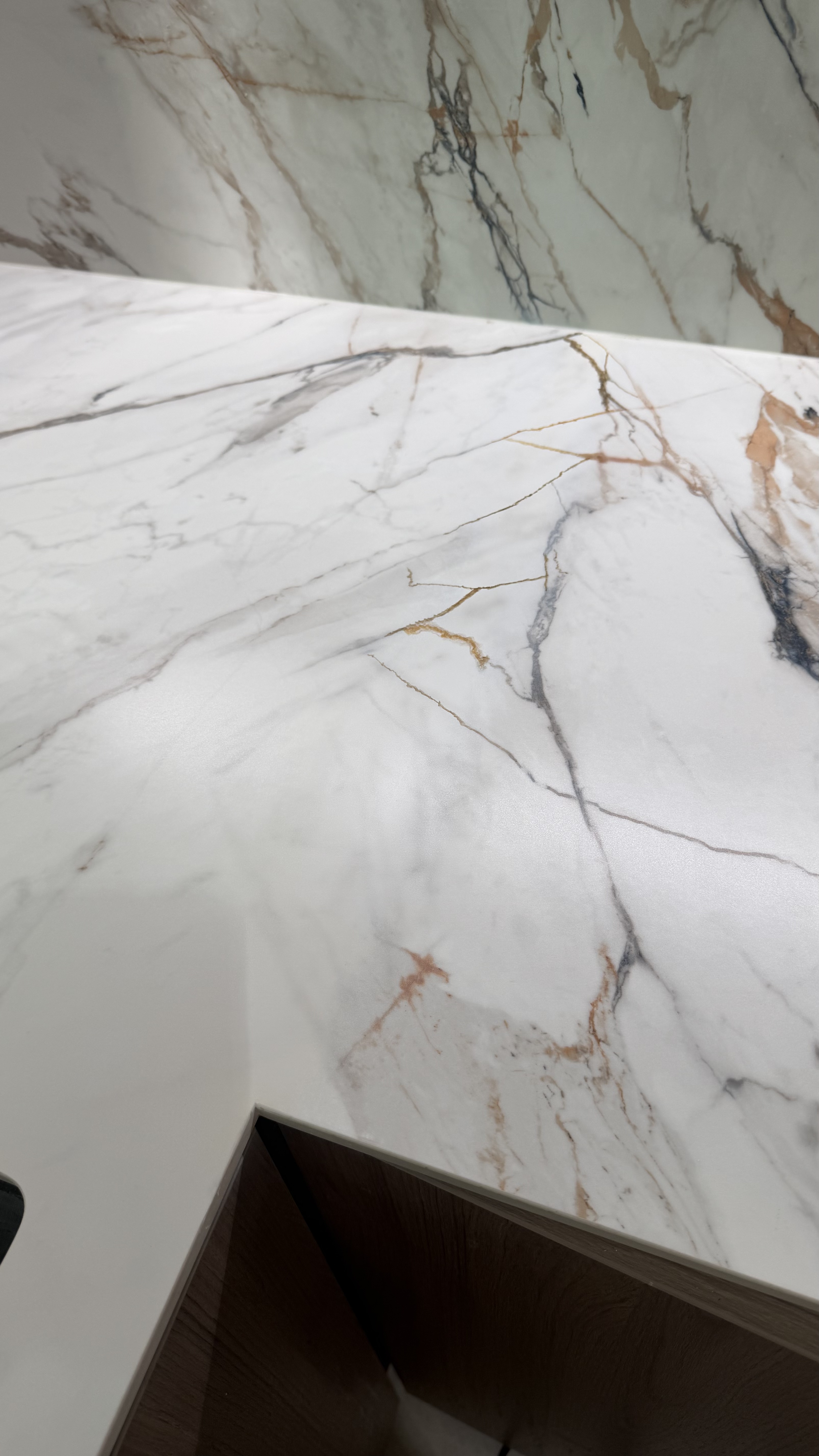 Veined Countertop Surface Repair — After: The same countertop area after surface finishing.
