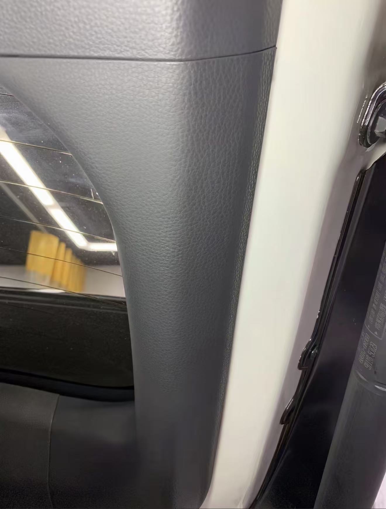 Interior Pillar Trim Restoration — After: The same pillar trim area after surface finishing.