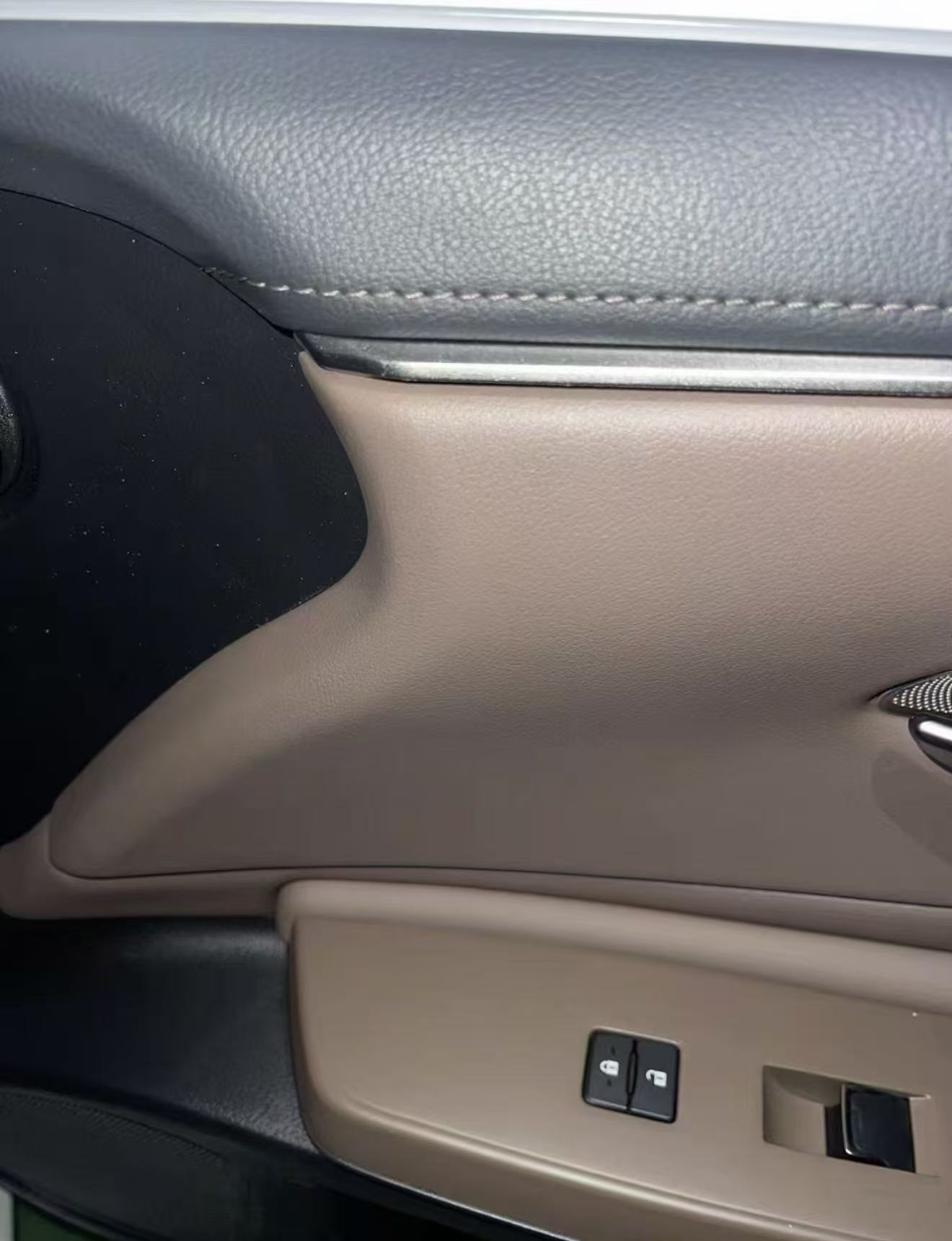 Car Door Interior Panel Repair — After: The door panel after repair and surface finishing.