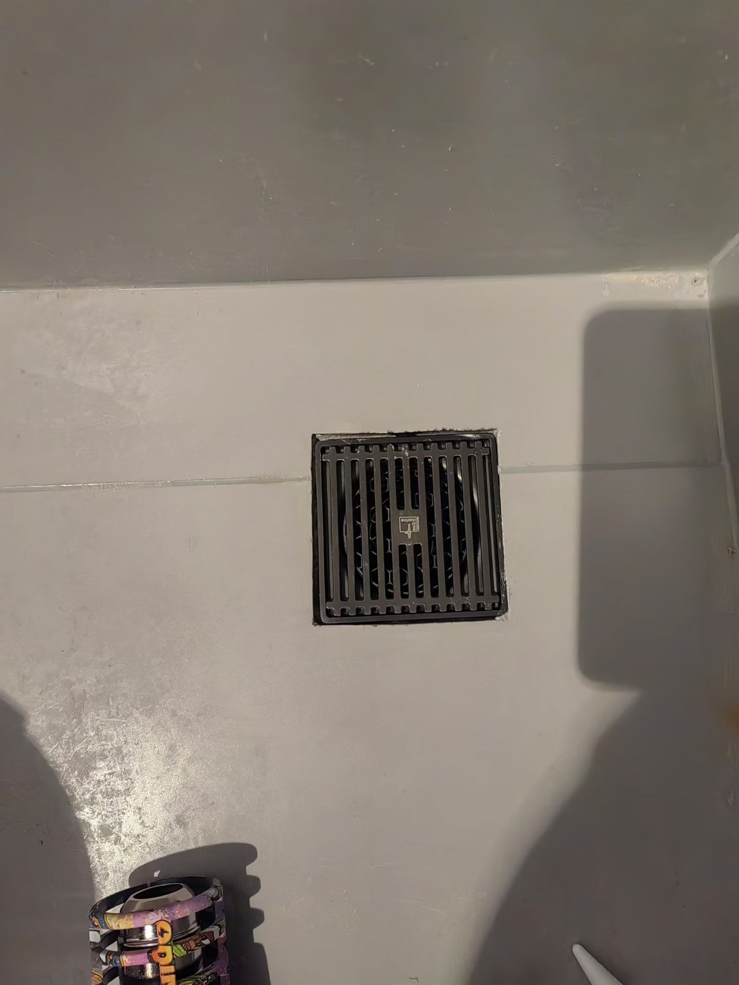 Floor Drain Surround Repair — After: The surface around the drain after repair.