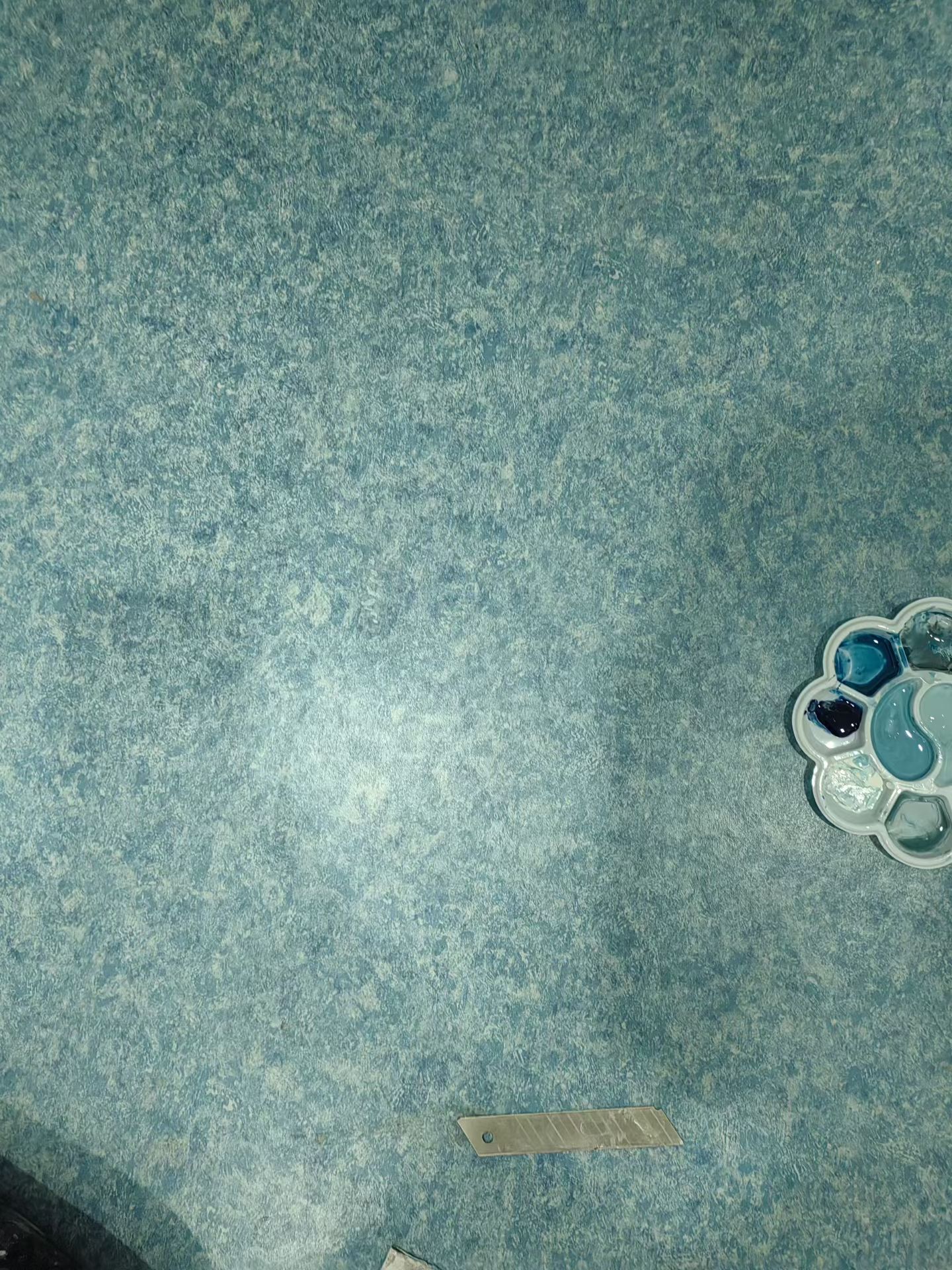 Patterned Surface Chip Repair — After: The patterned surface after repair and colour matching.