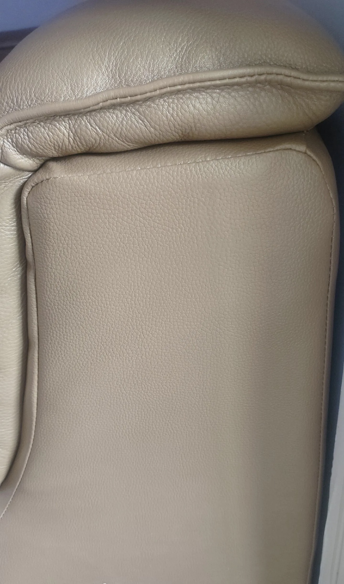 Beige Leather Sofa Scratch Repair — After: The same beige leather area after repair.