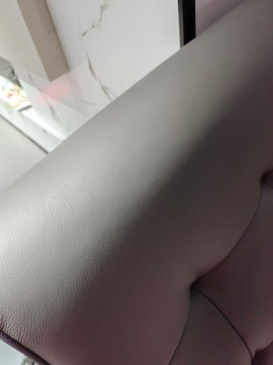 Grey Leather Sofa Surface Repair — After: The same grey leather surface after repair.
