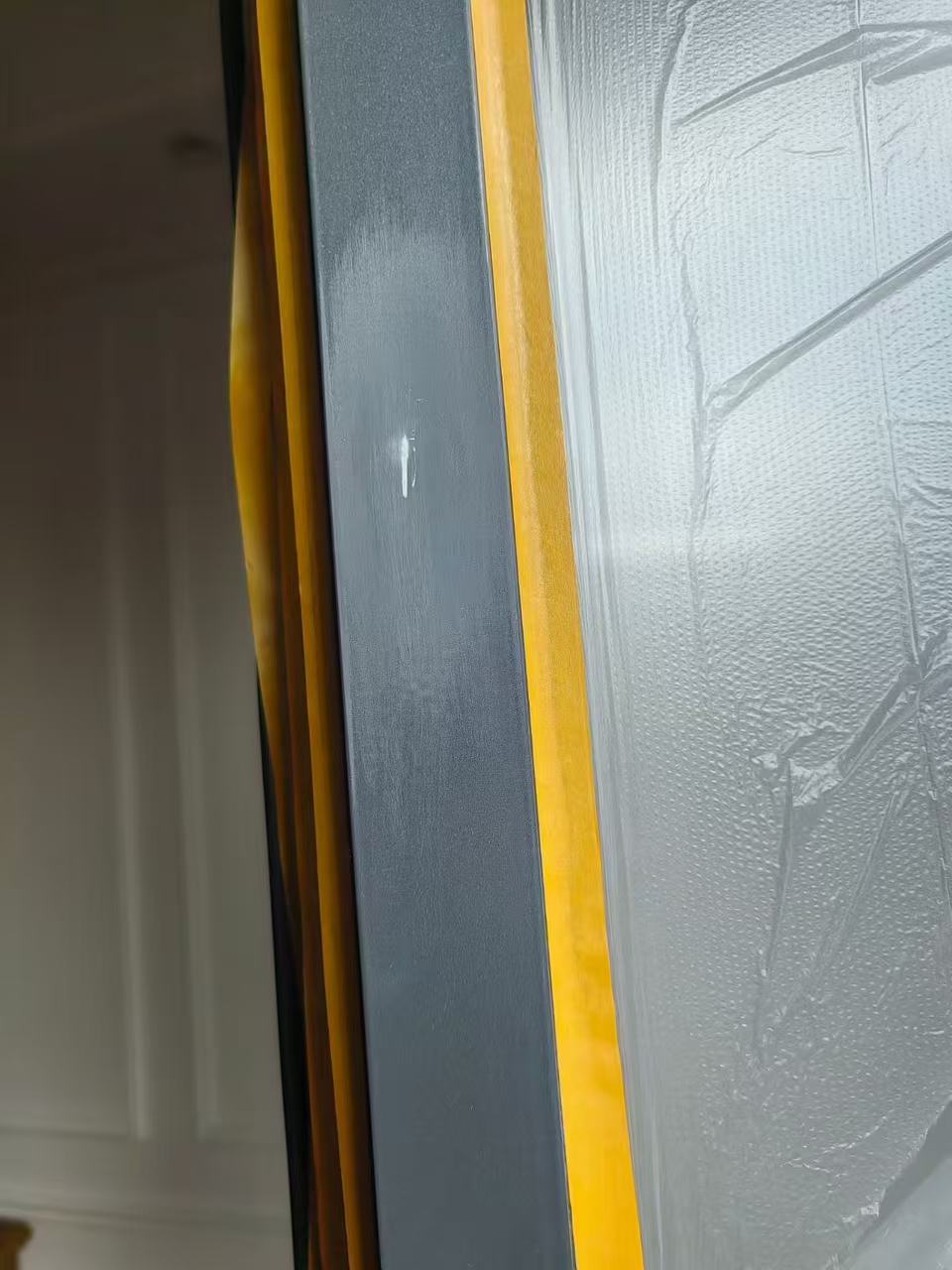 Blue Metal Frame Repair — Before: A marked area on the blue metal frame before finishing.