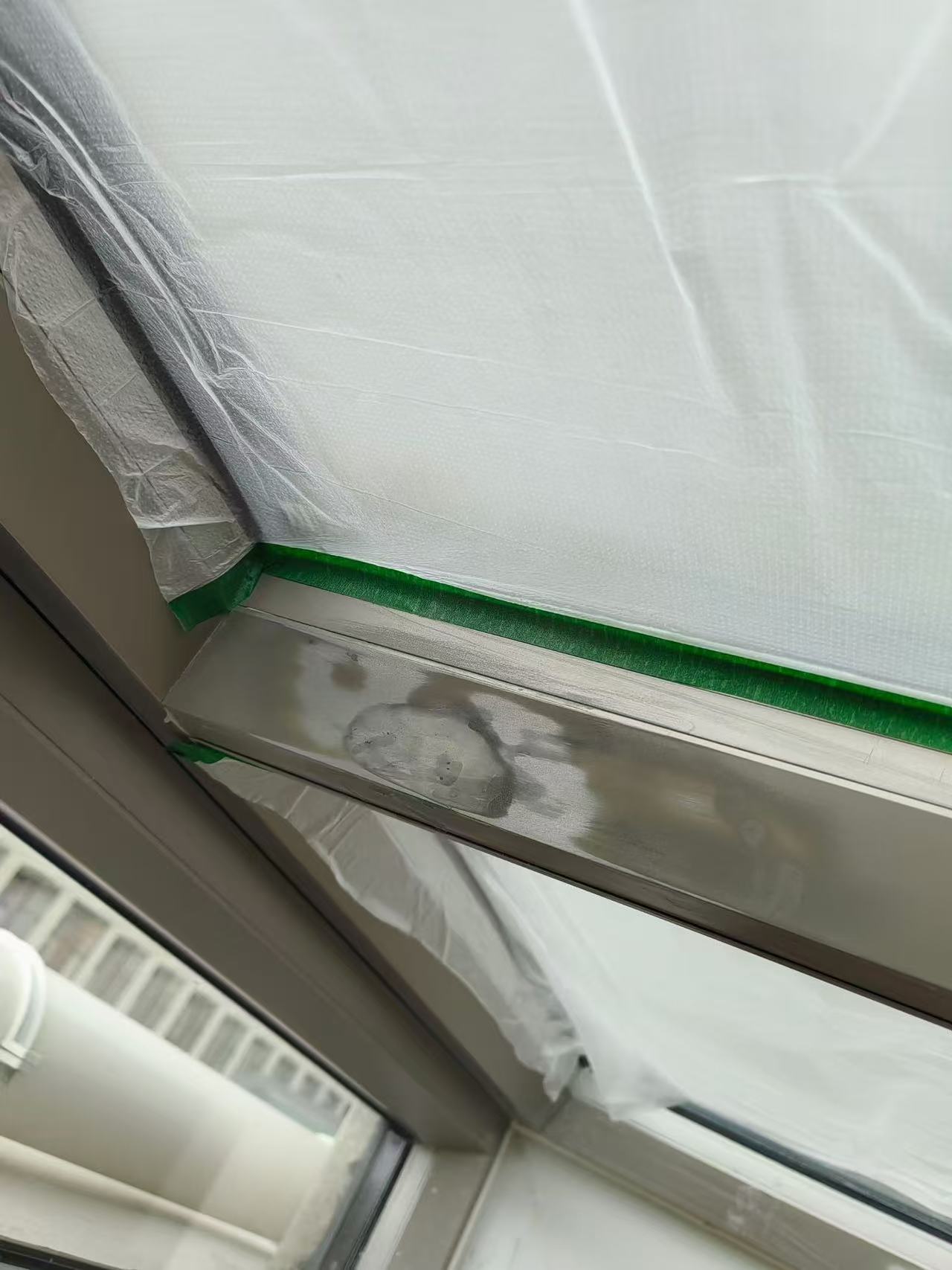 Metal Frame Crossbar Refinishing — Before: The metal crossbar with prepared repair areas before finishing.
