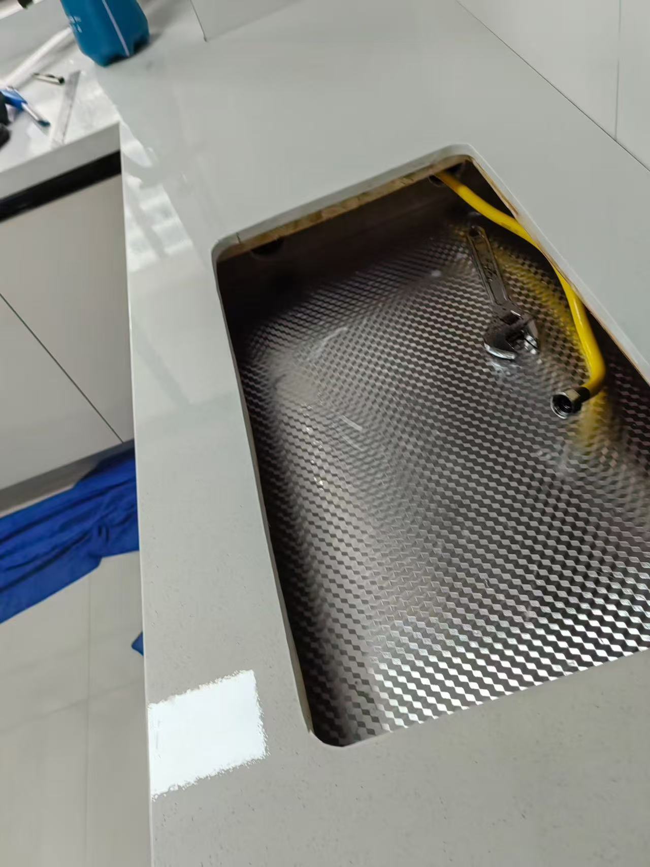 Marble Protection - Photo 6 — Project Photo: Kitchen sink surround with protective film applied.
