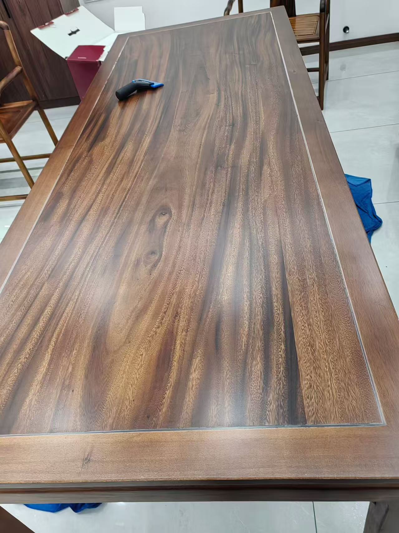 Marble Protection - Photo 16 — Project Photo: Wooden dining table with protective film applied.