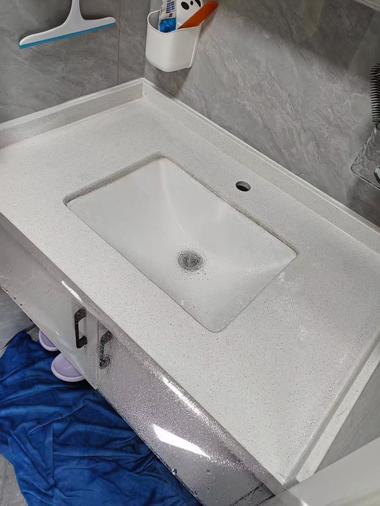 Marble Protection - Photo 17 — Project Photo: Bathroom vanity during protective film installation.