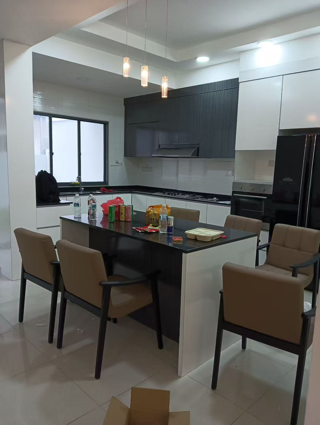 Custom Carpentry & Installation - Photo 9 — Project Photo: Kitchen cabinetry and dining island.