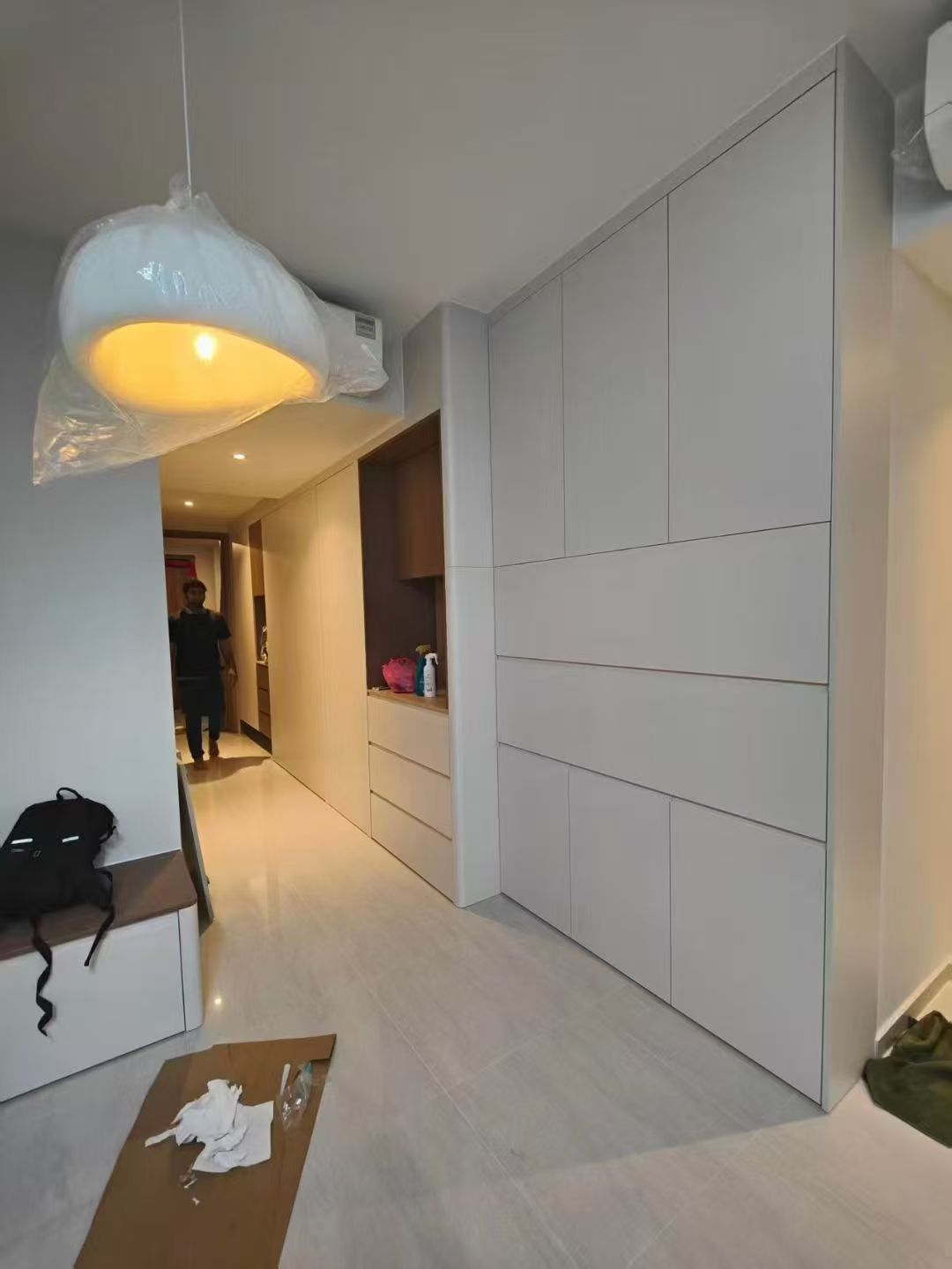 Custom Carpentry & Installation - Photo 10 — Project Photo: Full-height fitted storage cabinetry.