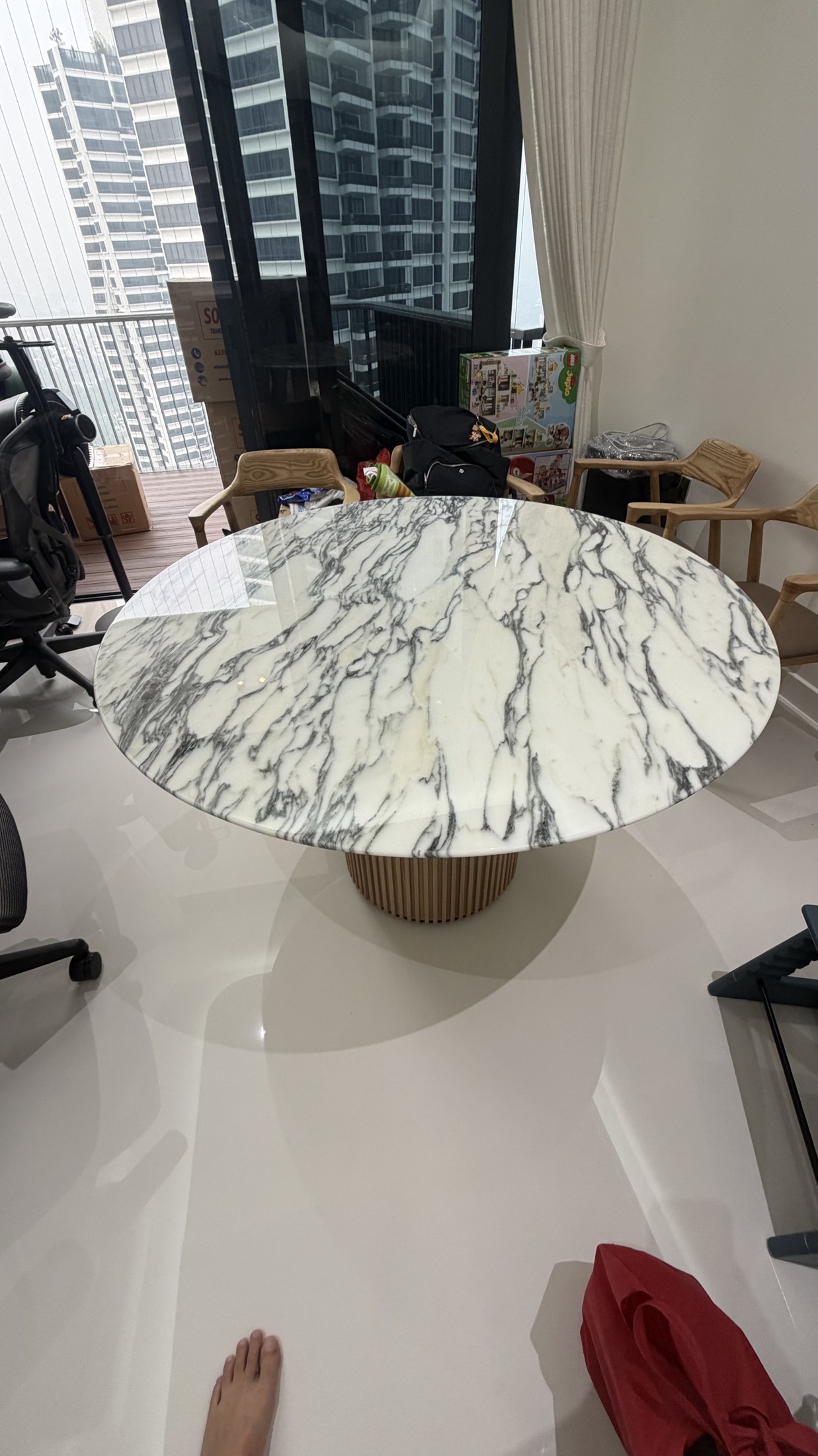Round Marble Table Protective Film Installation — After: Round marble dining table with protective film applied.